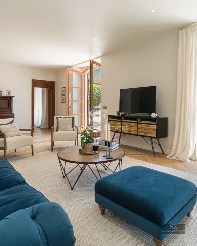 Modern villa exterior featuring a pool. Minimalist design, large windows, and manicured landscaping. Warm ambient lighting.