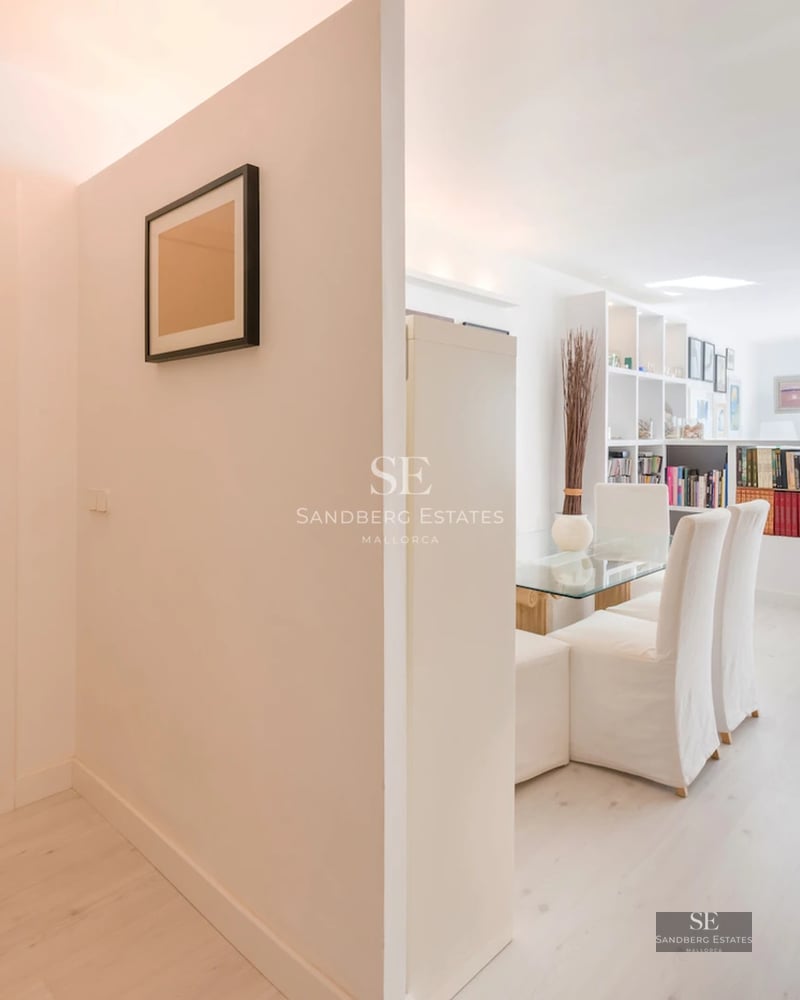 Exterior of a modern villa featuring an infinity pool, spacious terraces, lush greenery, and panoramic views. Minimalist and elegant design.