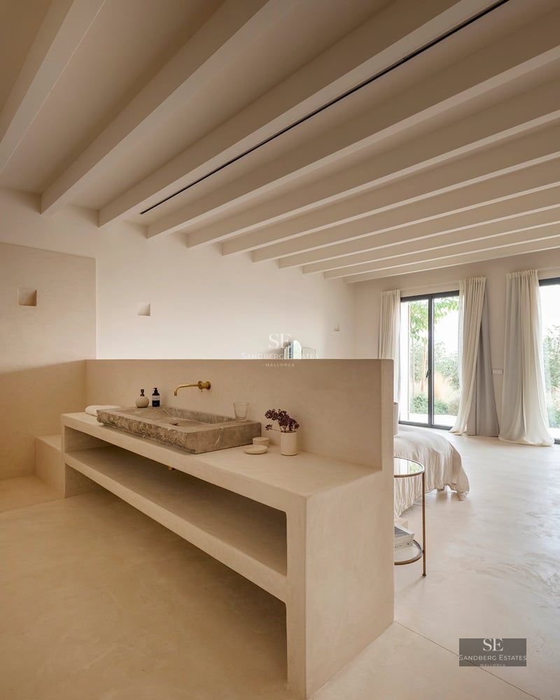 Spacious balcony with panoramic sea view. Modern design, glass railing, and stylish outdoor furniture. Ideal for relaxing and enjoying the view.