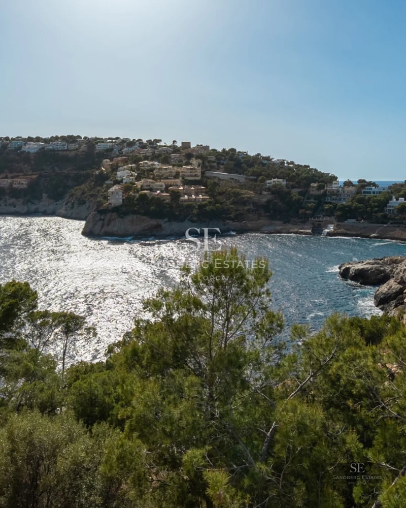Spacious terrace featuring an infinity pool and panoramic views. Modern architecture with clean lines and abundant natural light.