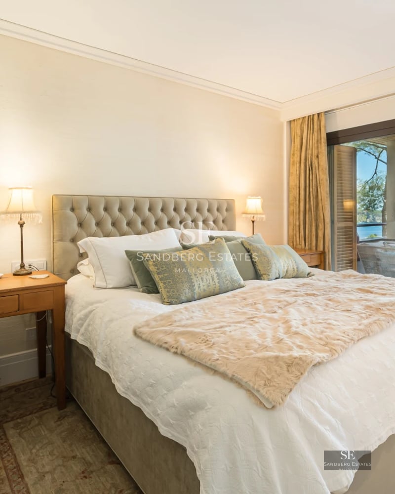 Exterior of a modern villa featuring a pool, large windows, and a lush garden. Minimalist and elegant design.