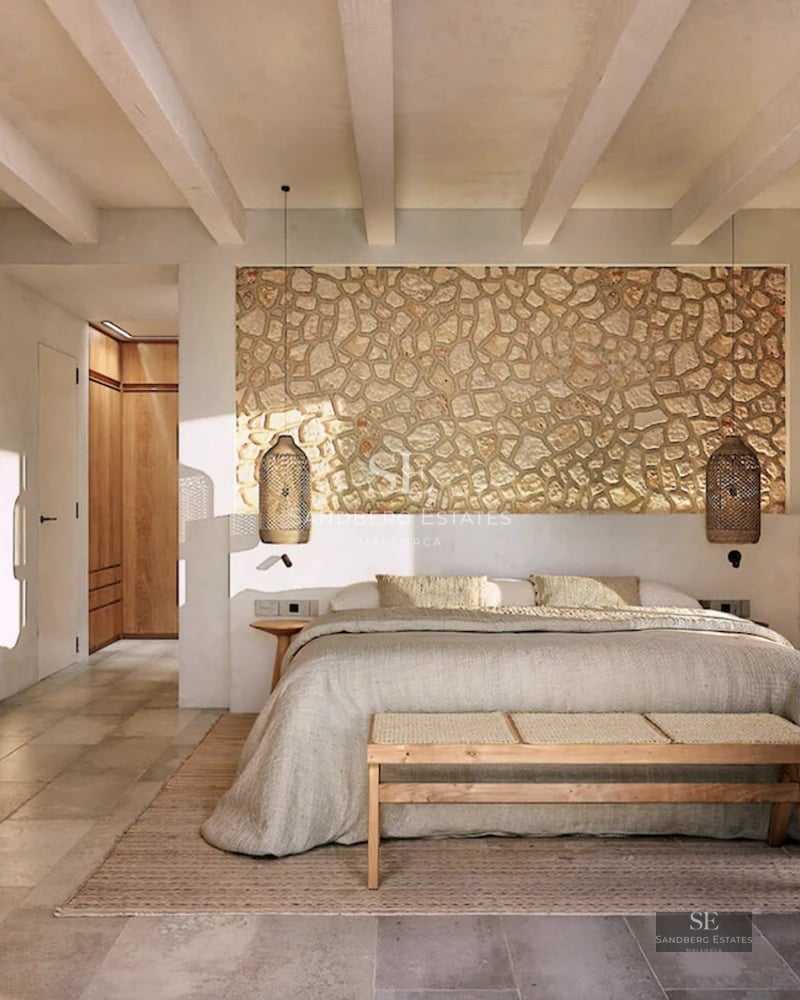 Exterior view of a modern villa with a sparkling blue pool, palm trees, and minimalist architecture. Warm natural lighting.