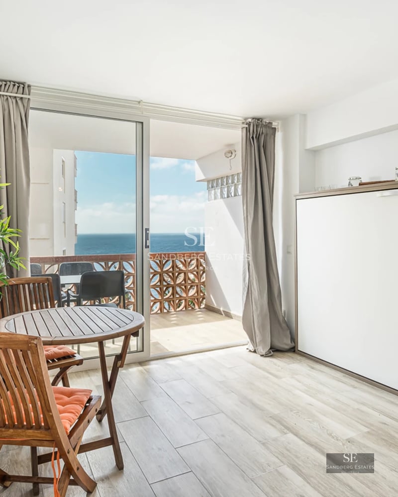 Spacious terrace with pool, sun loungers, and views. Modern design with high-quality materials. Natural lighting.