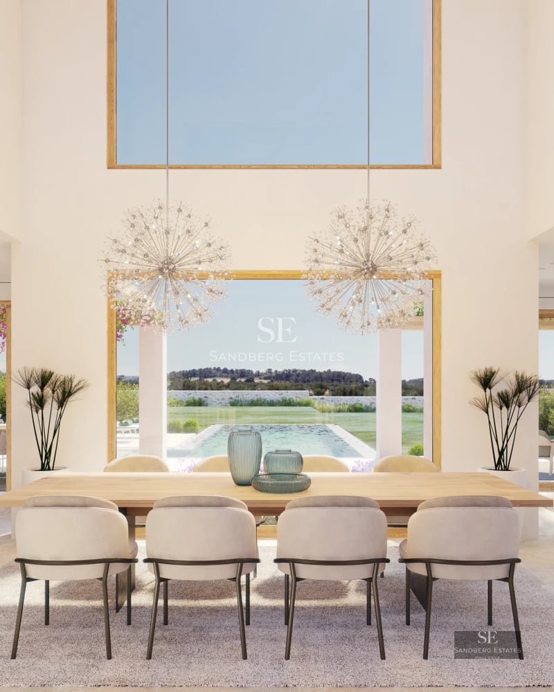 Spacious living room with large windows overlooking a modern pool. Designer sofas and abundant natural light.