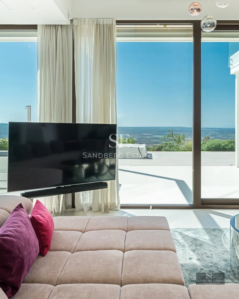 Spacious terrace with infinity pool, sun loungers, and panoramic views. Modern, elegant, and minimalist design. High-quality outdoor furniture.