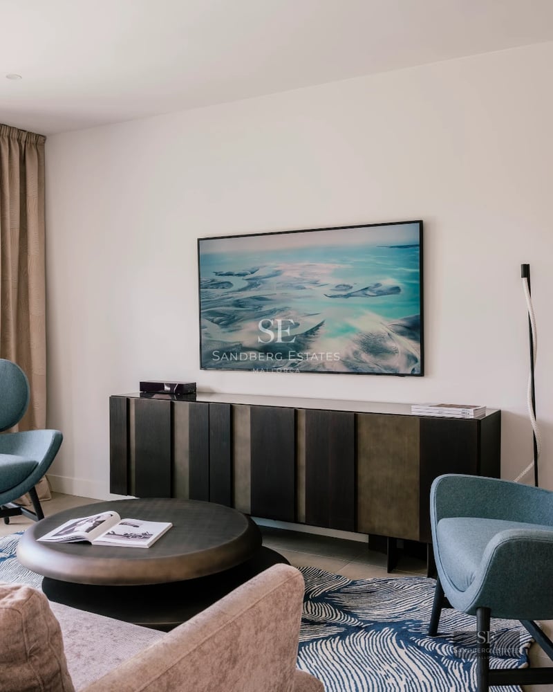 Spacious terrace with pool, designer furniture, and panoramic views. Modern architecture with clean lines and ample light.