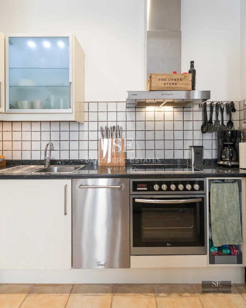Exterior view of modern villa with infinity pool, lush garden, and sleek architectural design. Large windows and terraces.