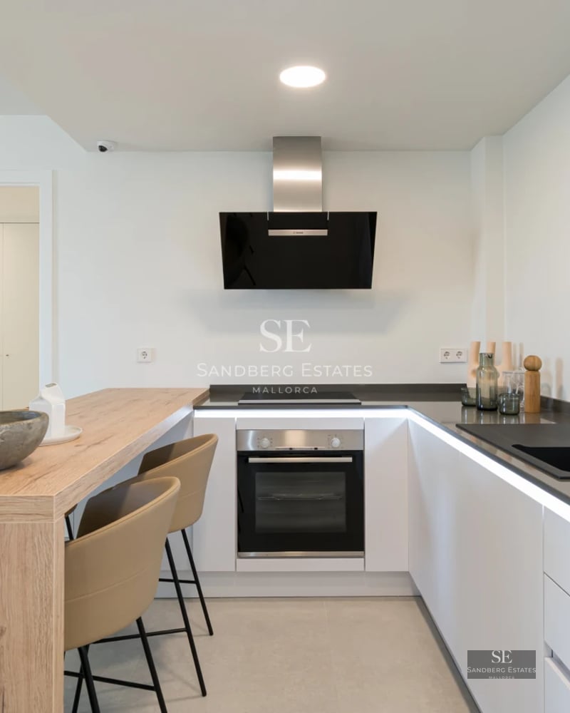 Exterior view of a modern villa with a pool, lush garden, and spacious terraces. Minimalist architecture with large windows.