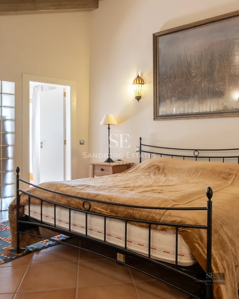 Pool view with outdoor seating area. Modern architecture with clean lines and large windows. Luxurious and relaxing space.