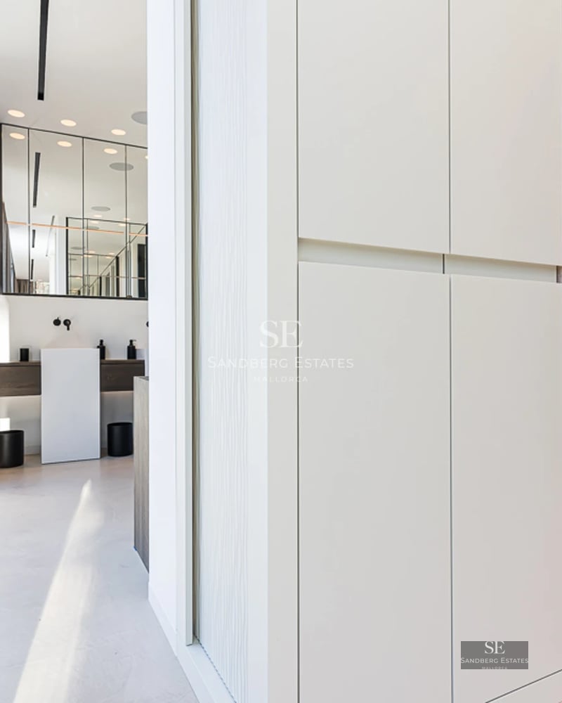 Bright interior. Window wall with sea view, modern sofa, coffee table and minimalist decor. Elegance and comfort define this space.