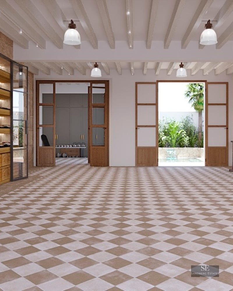 Spacious indoor garage with checkered tiles, stone walls, wooden beams, wine storage, and a white scooter.