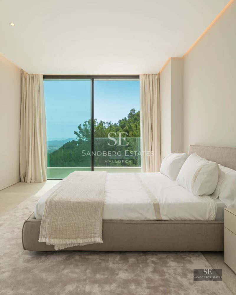 Exterior view of a modern villa with an infinity pool, lush garden, and minimalist architecture. Large windows and natural light.