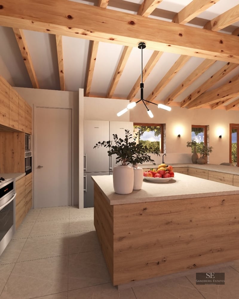 Spacious kitchen featuring exposed wood beams, light oak cabinetry, and a large central island.