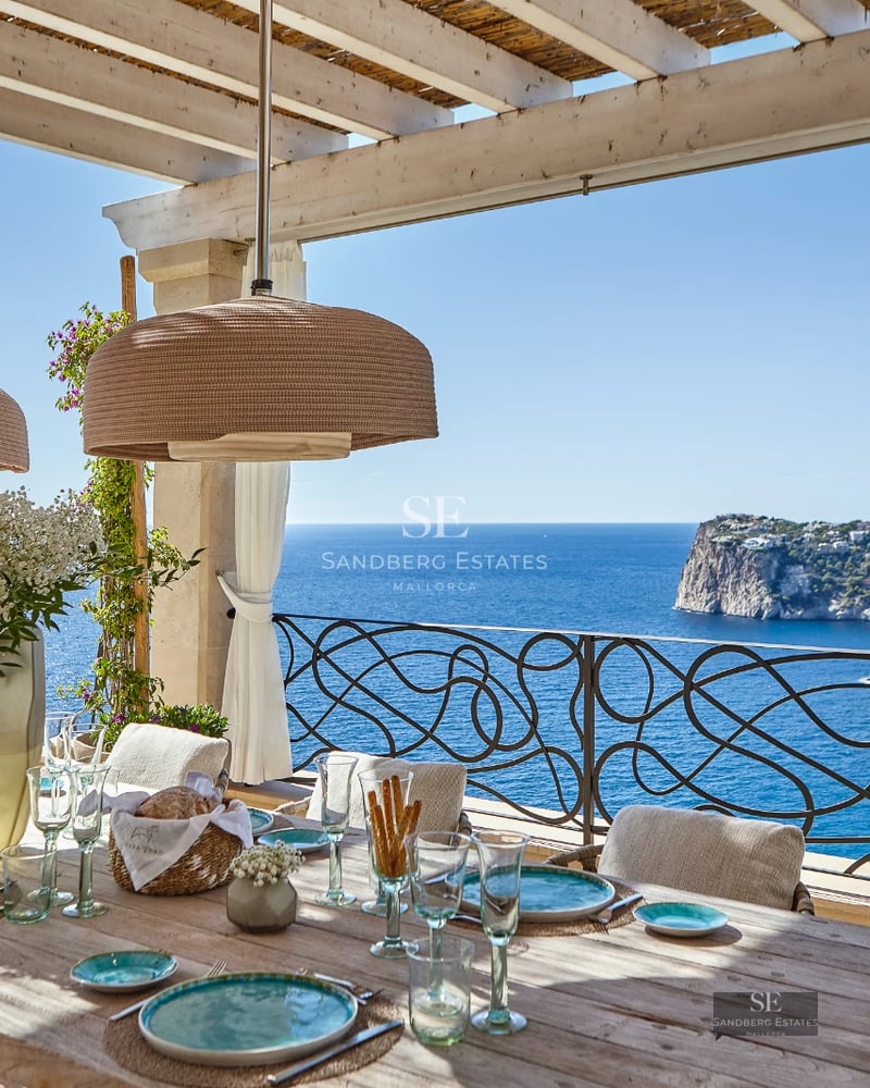 Expansive terrace featuring an infinity pool, sun loungers, and panoramic views. Modern design with sleek finishes. Ideal for relaxation and entertainment.