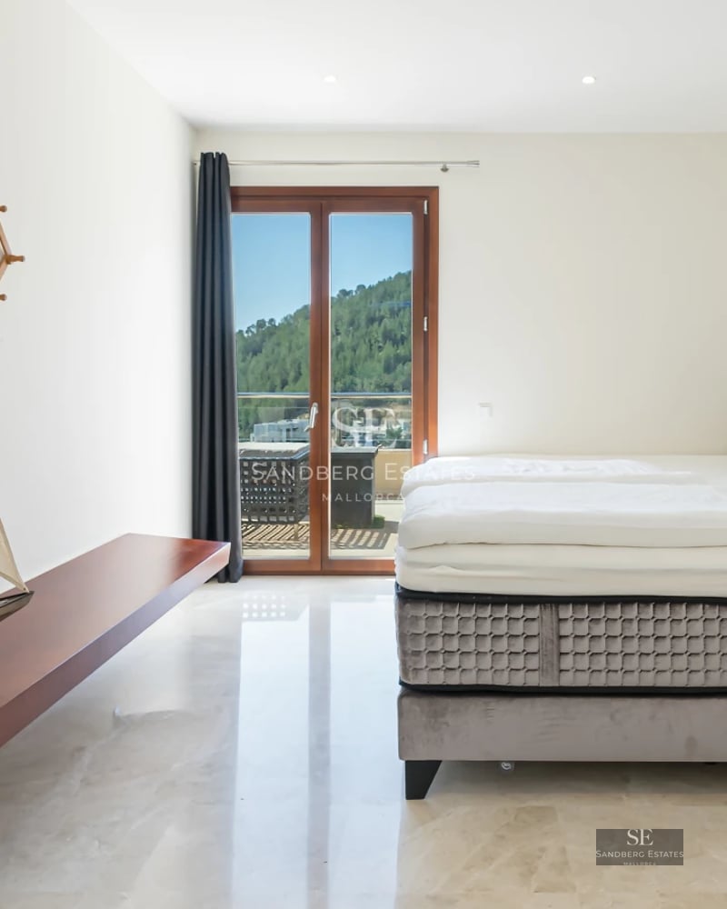 Exterior view of a modern house with a pool, wooden deck, and large windows. Lush garden. Contemporary and elegant design.