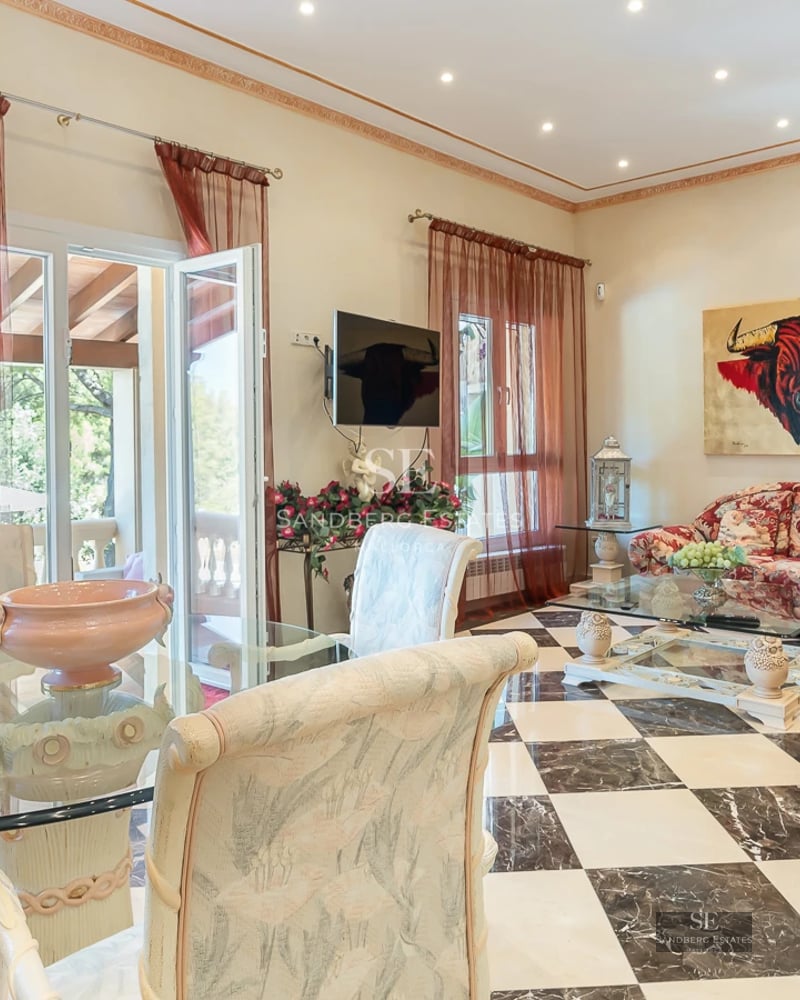 Exterior view of a modern villa with a pool. Clean architecture, large windows, lush gardens, and manicured landscaping. Minimalist design.