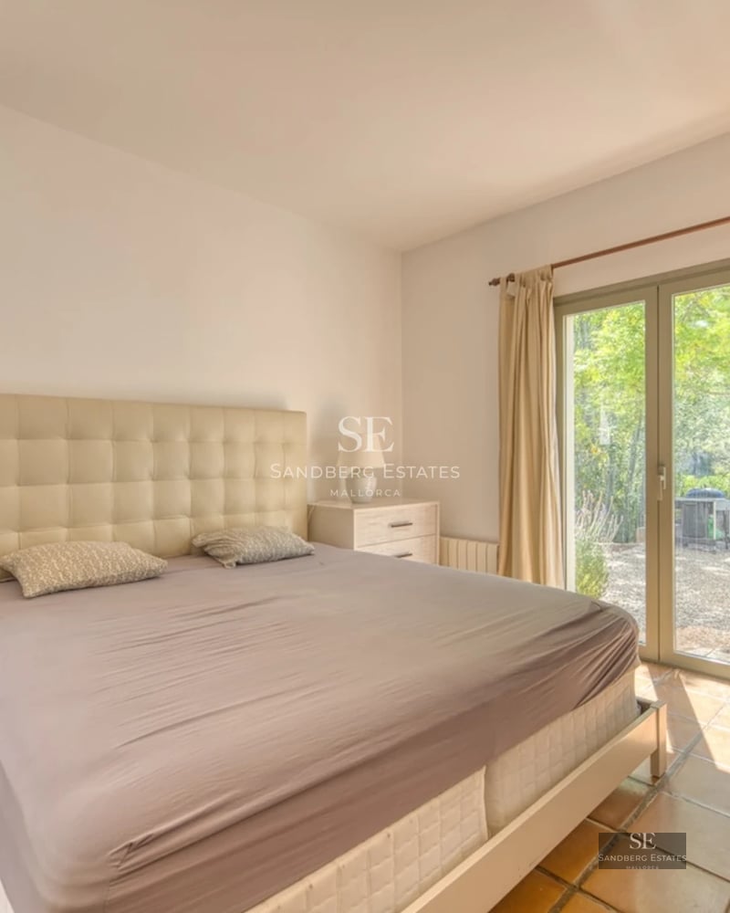 Exterior view of a modern villa with a pool. Minimalist design, large windows, terrace, and manicured landscaping.