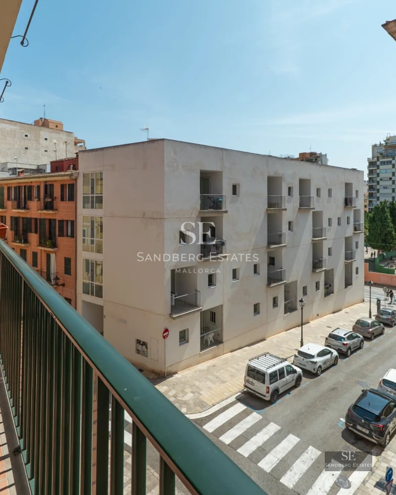 Expansive outdoor space featuring reflective pool, modern furniture, and lush greenery. Elegant landscaping with ambient lighting.
