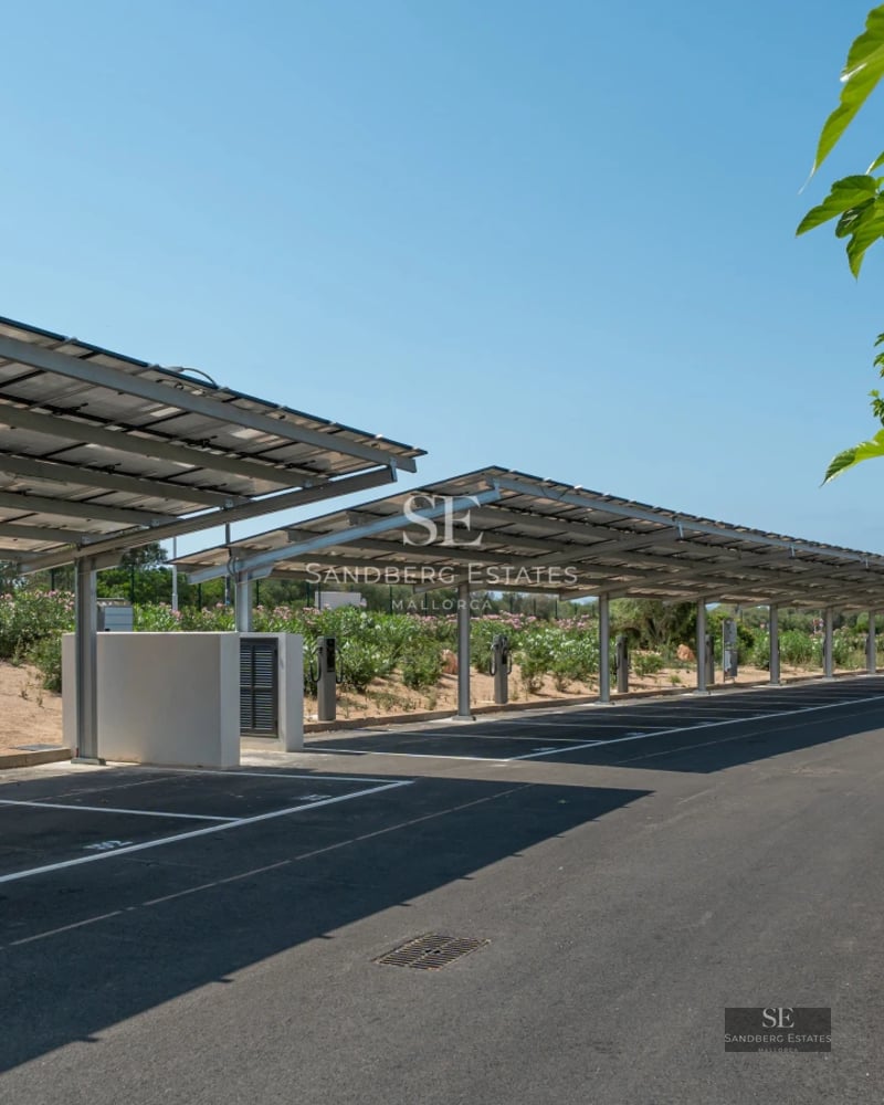 Expansive terrace with infinity pool, modern furniture, panoramic views, and lush greenery. Elegant and minimalist architectural design.