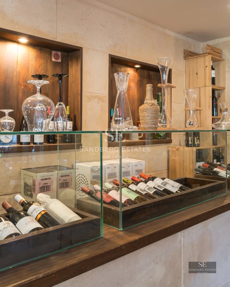 Spacious balcony with panoramic sea views, modern and elegant furniture. Minimalist design with glass railing.