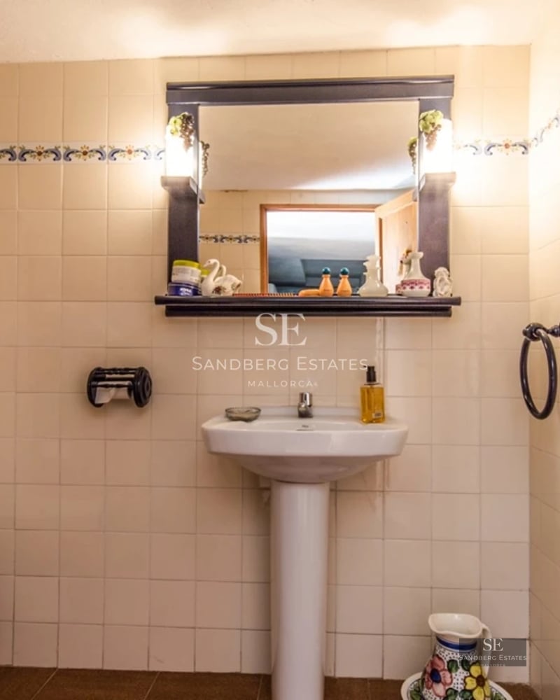 Spacious terrace featuring a swimming pool, sun loungers, and garden view. Modern design with natural lighting and luxurious finishes.