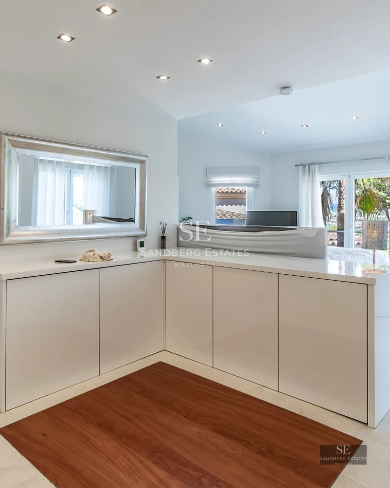 View of pool, garden, terrace with modern furniture. Minimalist design, natural lighting, high-quality finishes.