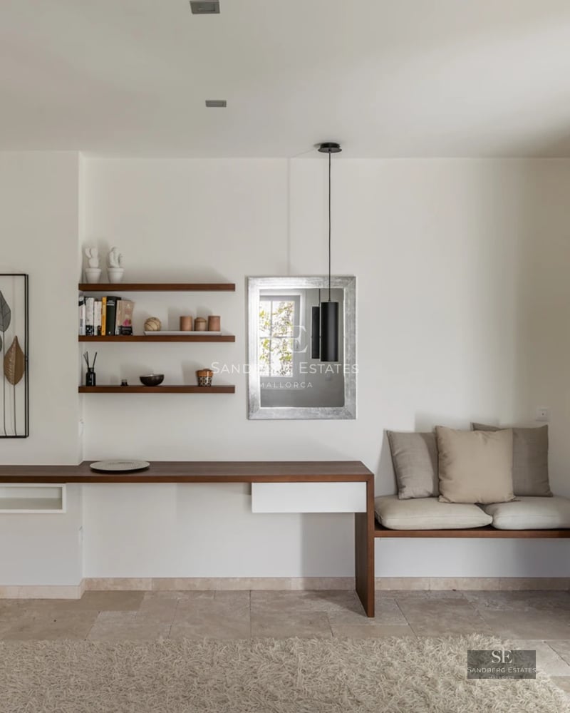 Exterior view of a modern villa featuring a pool, lush garden, and minimalist architecture. Natural lighting and high-quality finishes.