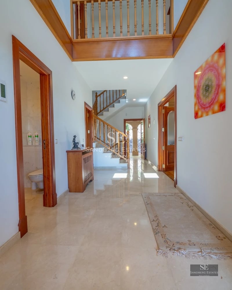 Spacious terrace with infinity pool, sun loungers, and panoramic views. Modern design with ambient lighting and luxury finishes.