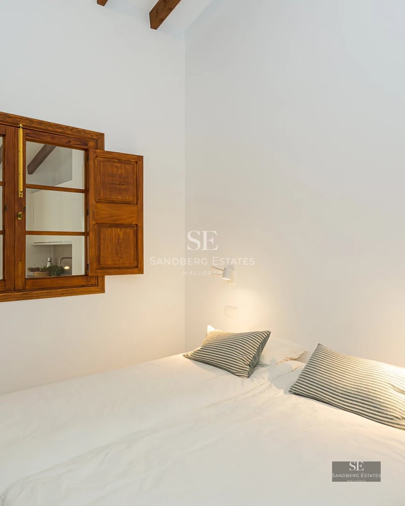 Exterior view of a modern villa with infinity pool and large windows. Minimalist design, lush garden, warm lighting.