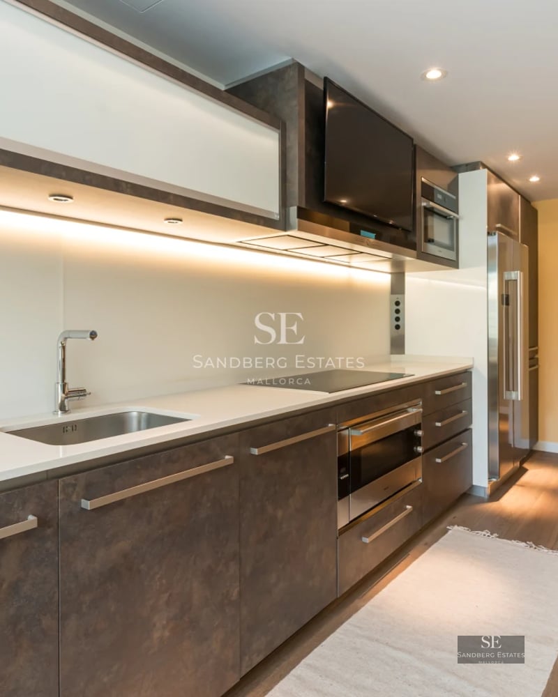 Exterior view of a modern villa featuring a swimming pool, garden, and large windows. Minimalist architecture with high-quality finishes.