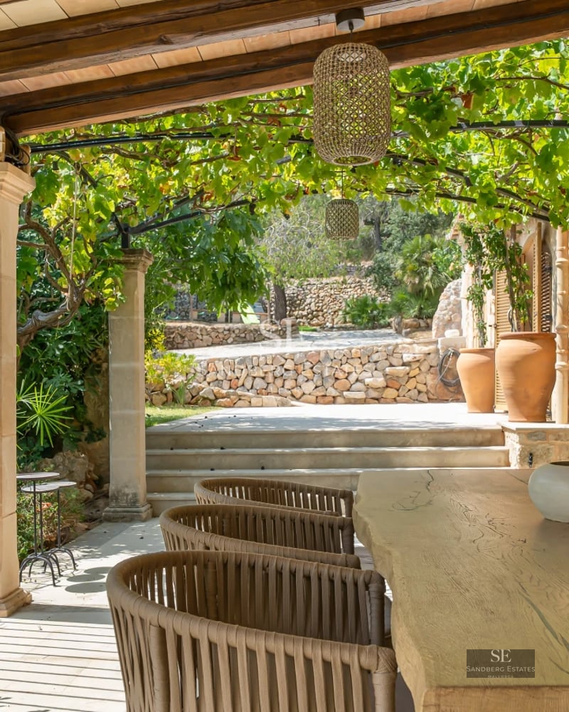 Exterior view of a luxurious residence with infinity pool, lounge chairs, and modern design. Minimalist architecture, blue sky.