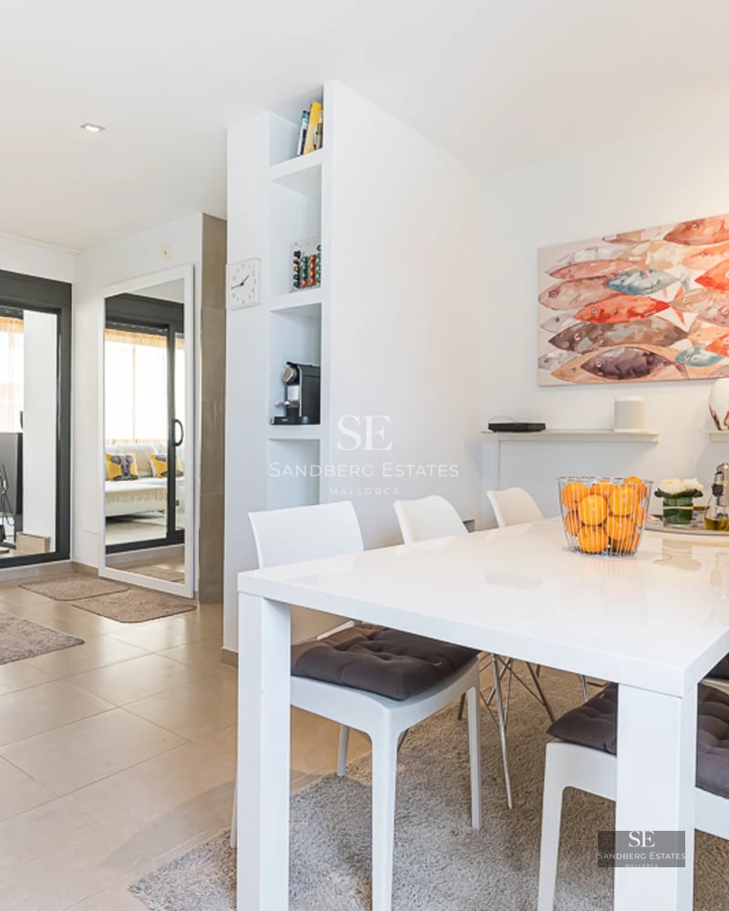 Infinity pool view with blurred edge, sun loungers, and panoramic sea views. Modern and minimalist design.