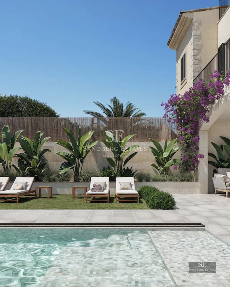 Modern terrace with infinity pool and panoramic sea views. Minimalist design, elegant furniture, and abundant natural light.
