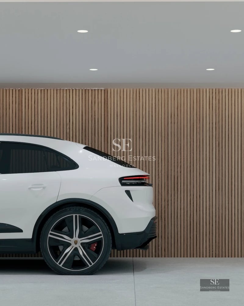 Image of a sleek exterior with a pool, sun loungers, and modern architecture featuring large windows.