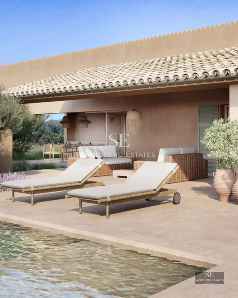 Spacious living room with large windows, light wood floors, gray sofas, and minimalist decor. Panoramic sea views.