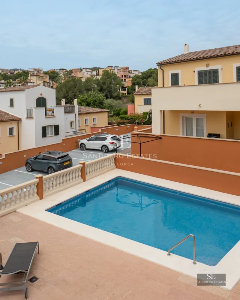 Exterior view of modern house with pool, lush garden, and high-quality finishes. Minimalist architecture.