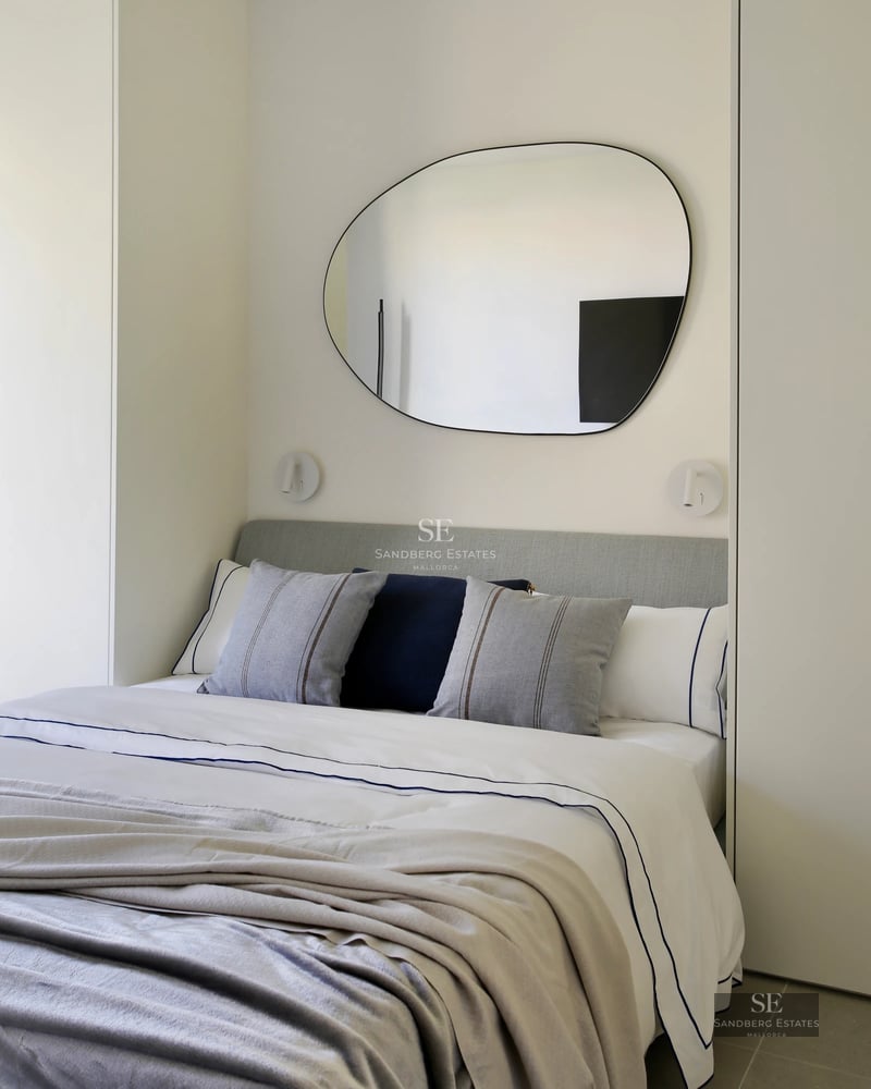 Expansive terrace with infinity pool, sun loungers, and panoramic sea views. Modern architecture with clean lines and abundant natural light.