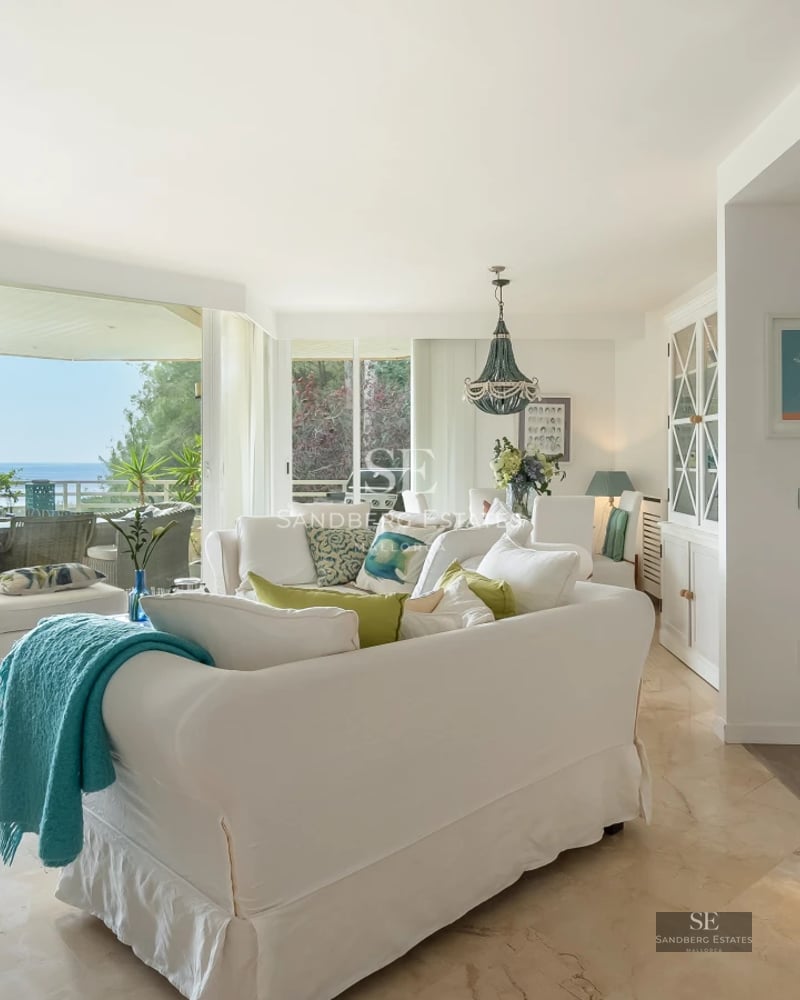 Spacious terrace featuring an infinity pool and panoramic views. Modern design with stylish outdoor furniture and lush greenery.