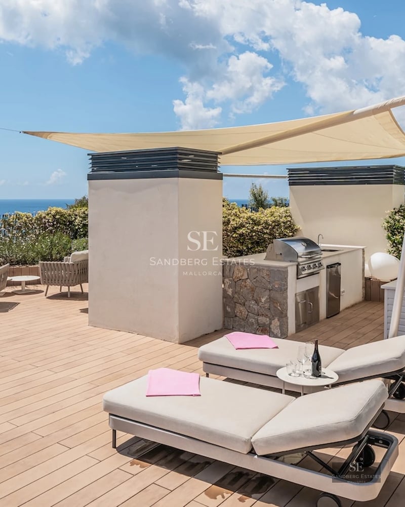 Exterior view of a modern villa with a pool, large garden, and minimalist architecture. Warm lighting highlights the facade.