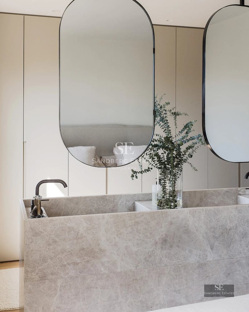 Exterior view of a modern villa with a pool, surrounded by greenery. Minimalist architecture, clean lines and large windows.