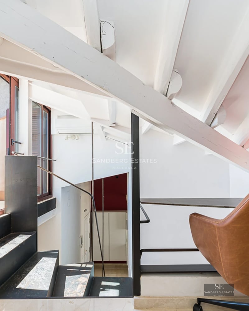 Spacious balcony with sea view. Modern and elegant furniture. Glass railing offering unobstructed view.