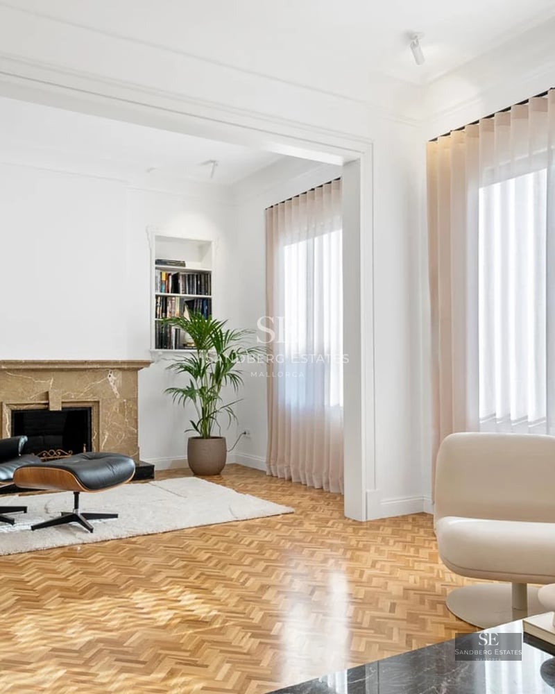 Exterior view of a modern villa with a pool, spacious gardens, and minimalist design. Natural lighting highlights high-quality materials.