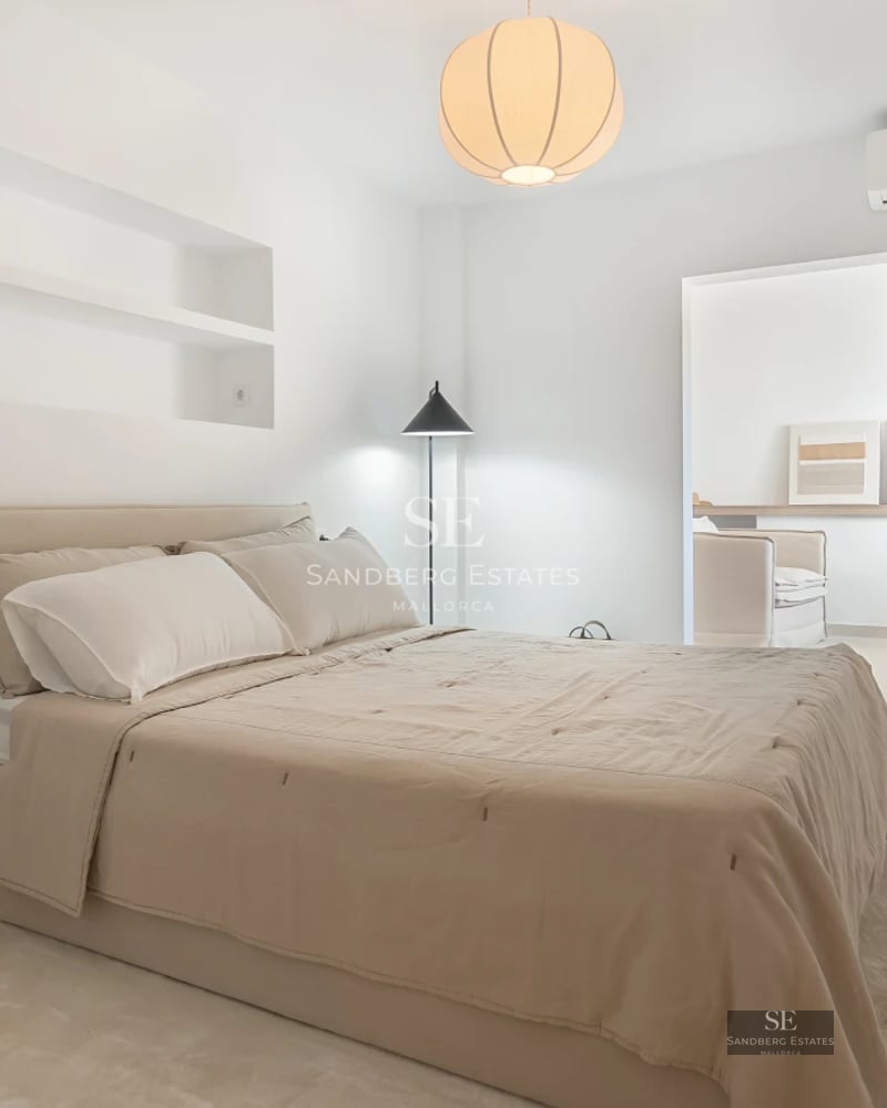 Modern villa facade with pool, large windows, and minimalist design. Warm lighting and lush landscaping.