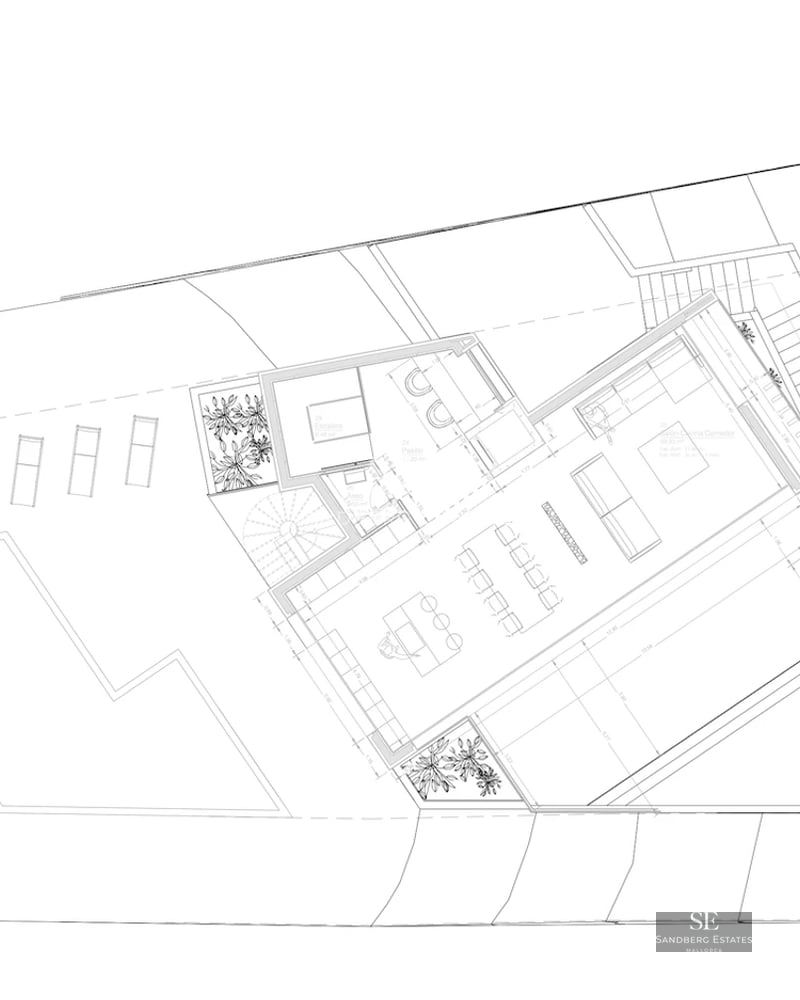 Spacious living room with large windows offering panoramic sea views. Modern design, elegant furniture, and abundant natural light.