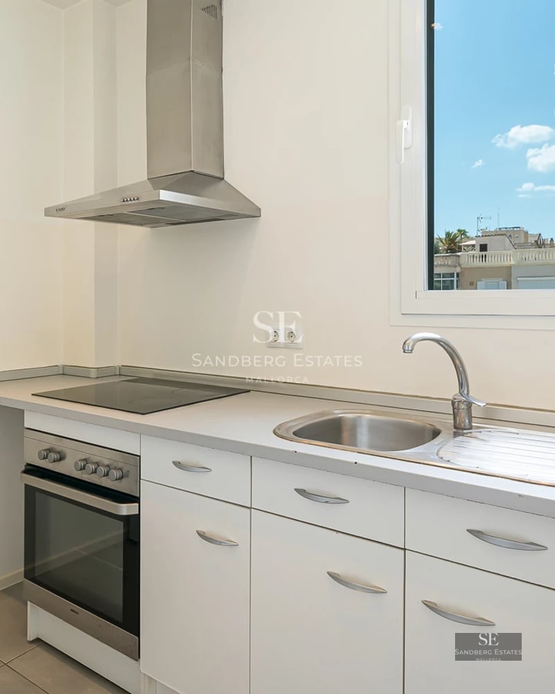 Exterior view of a modern villa with pool, terrace, and lush vegetation. Sleek architecture with large windows.