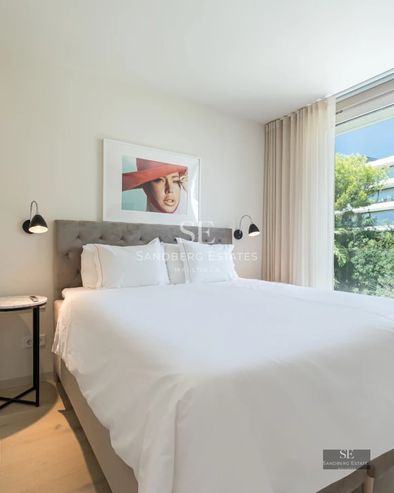 Spacious terrace featuring a pool, sun loungers, and panoramic views. Modern design, natural lighting, and high-quality finishes.