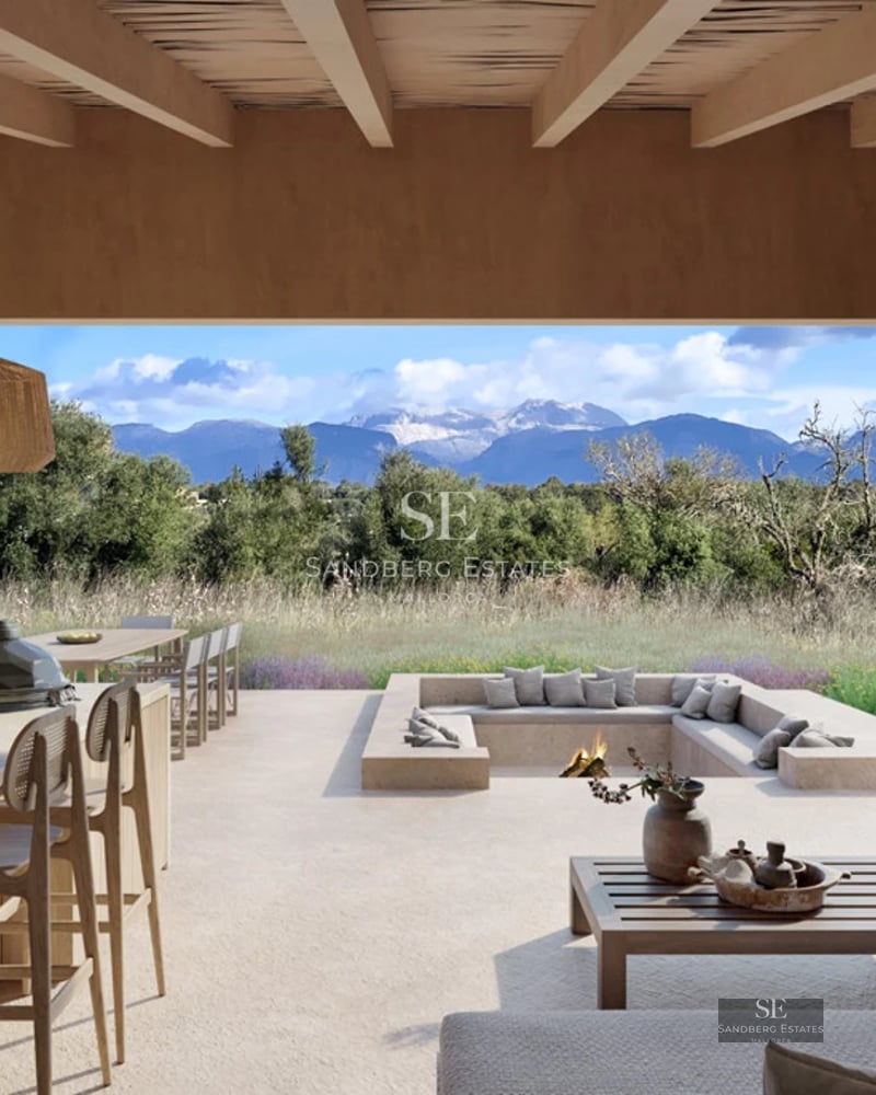 Spacious living room with large windows, natural light, light wood floors, and modern furniture. Panoramic city views.