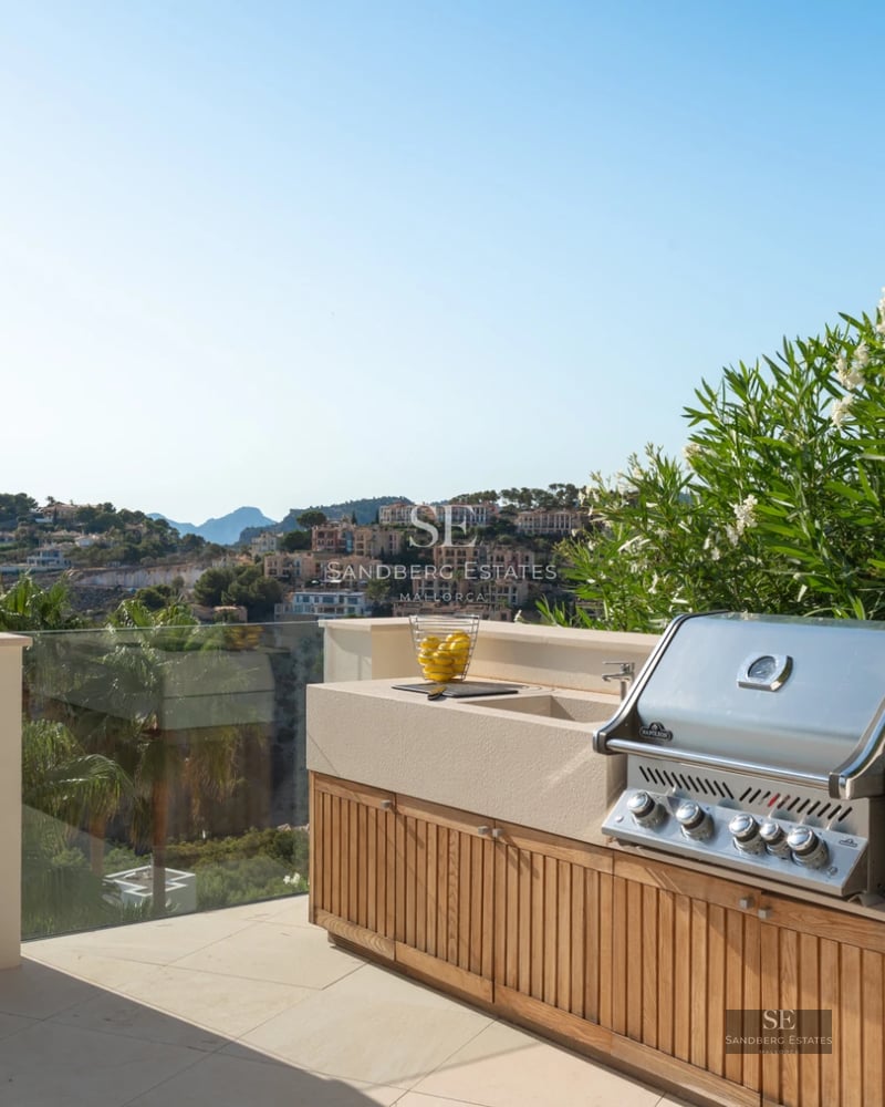 Bright interior with expansive views. Modern design, sleek pool, and sunny terrace. Contemporary architecture and high-end finishes.