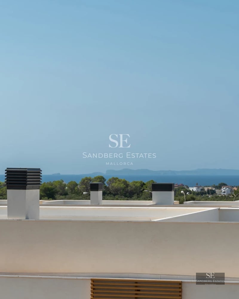 Spacious living room with sea view, large windows, modern design, expansive terrace, and high-end furniture.