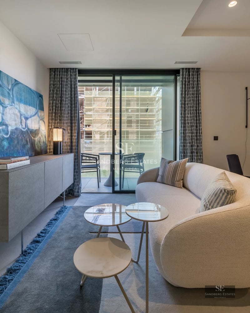 Exterior of a modern villa featuring a pool, terraces, and large windows. Sleek design with clean lines and lush landscaping.
